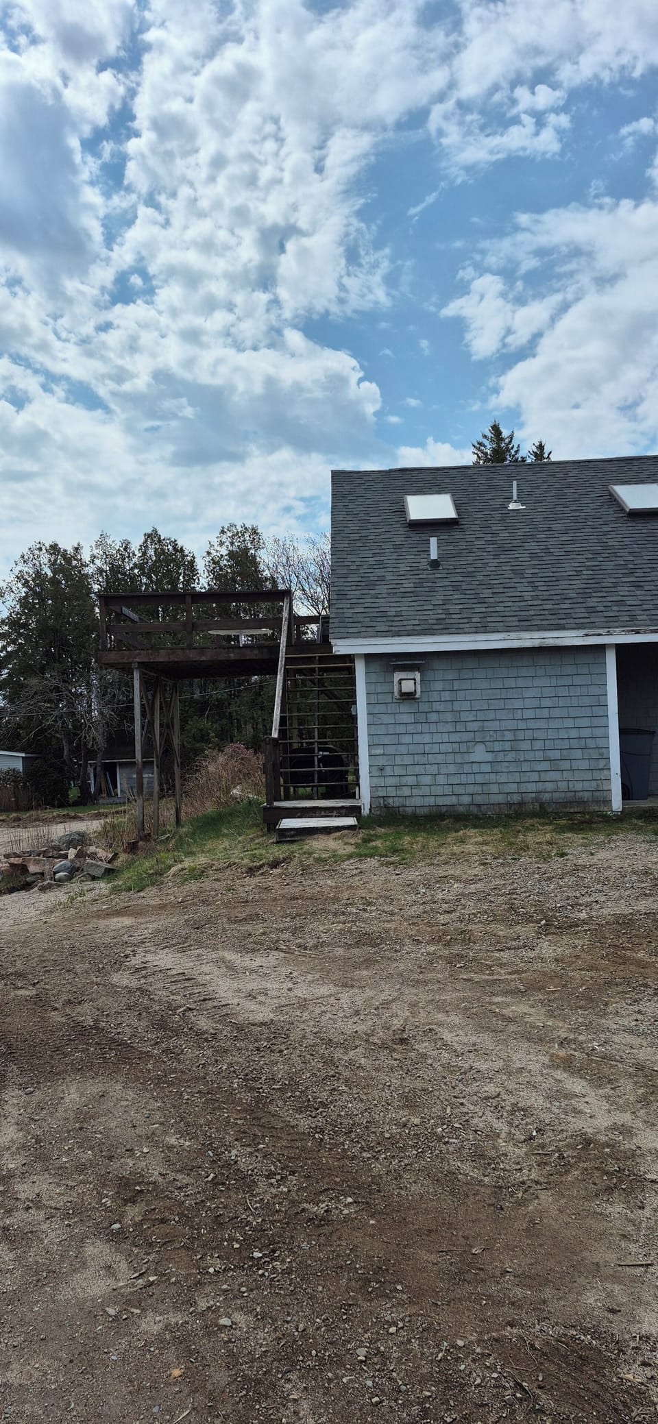 The entrance to the apartment is at the top of the stairs.
