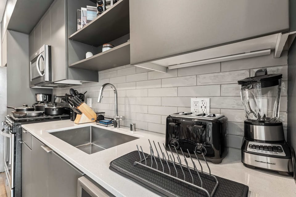 Sleek open kitchen layout flowing naturally into the dining area - ideal for hosting family dinners or casual breakfasts.