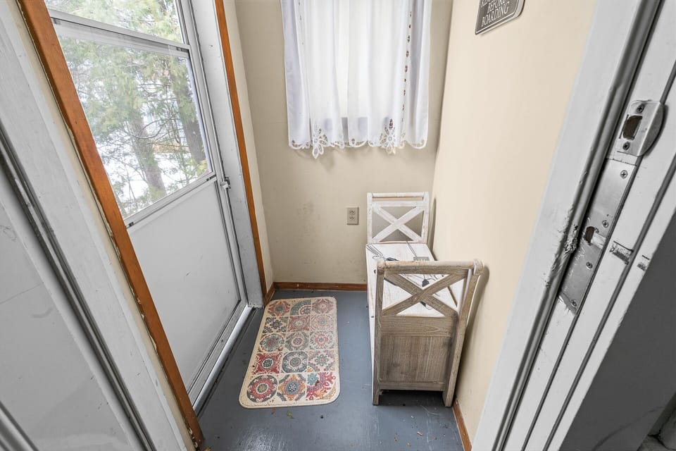 Enter into a small mud room.