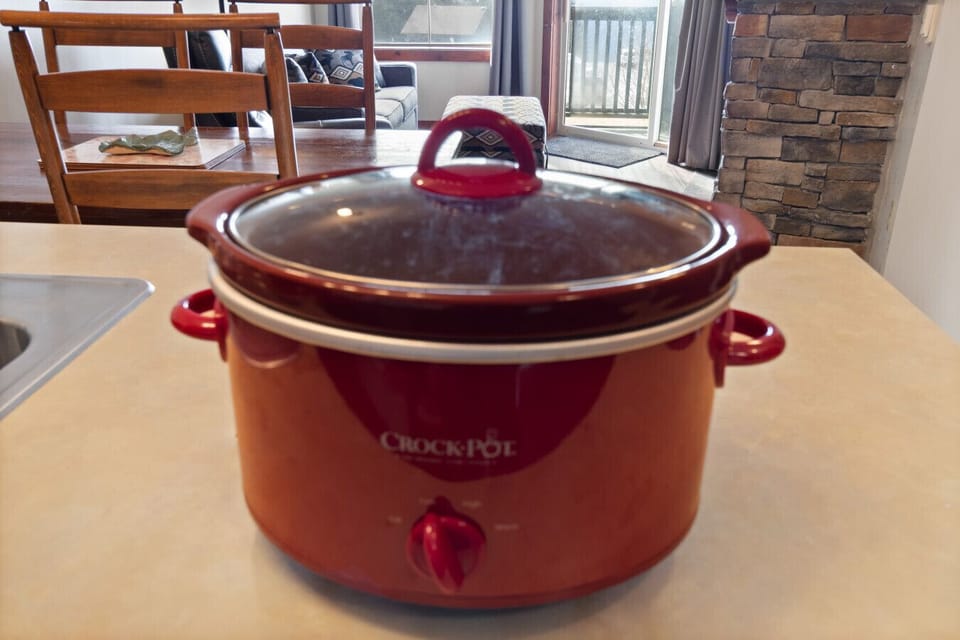 There is a crockpot in the kitchen