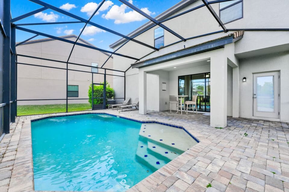 Enjoy your private, fully fenced pool—perfect for a refreshing swim or lounging under the sun.