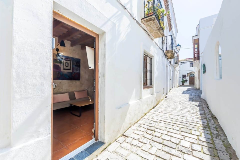 Tarifa chic night wave studio street view