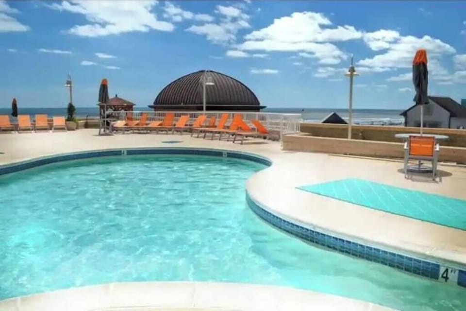 Splash the day away at Atlantic Palace's shared seasonal pool!