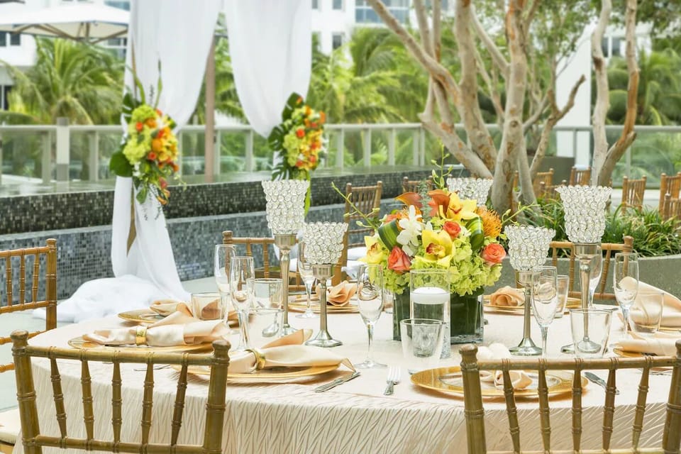 Celebrate under open skies with elegant tables and tropical breezes.