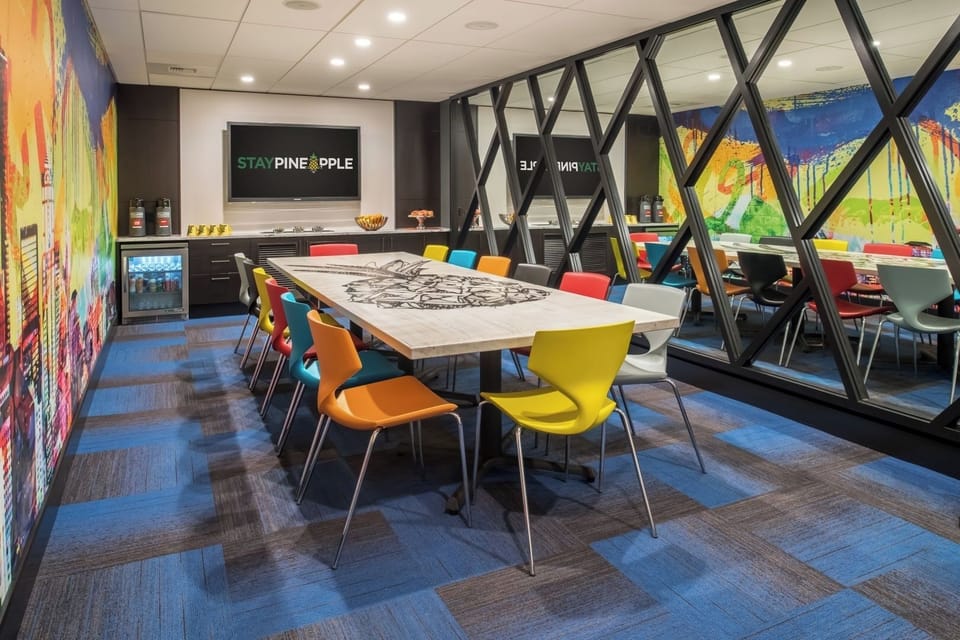 Host ideas around a statement table in a creative meeting room
