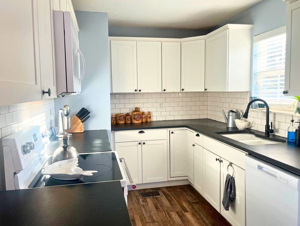 Our fully stocked kitchen has a full-size oven stove & dishwasher.