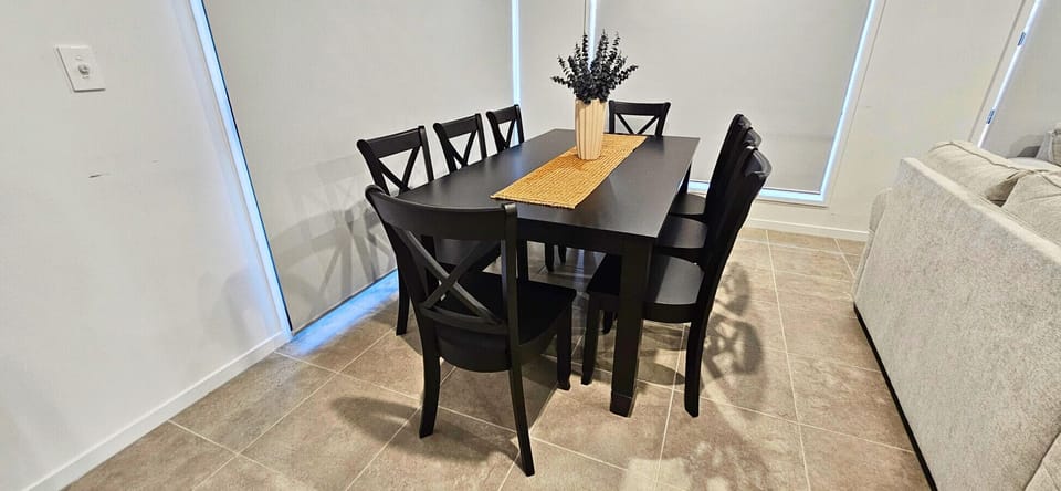 Enjoy meals together at the large 8-seater dining table – perfect for families or groups to gather and dine comfortably.