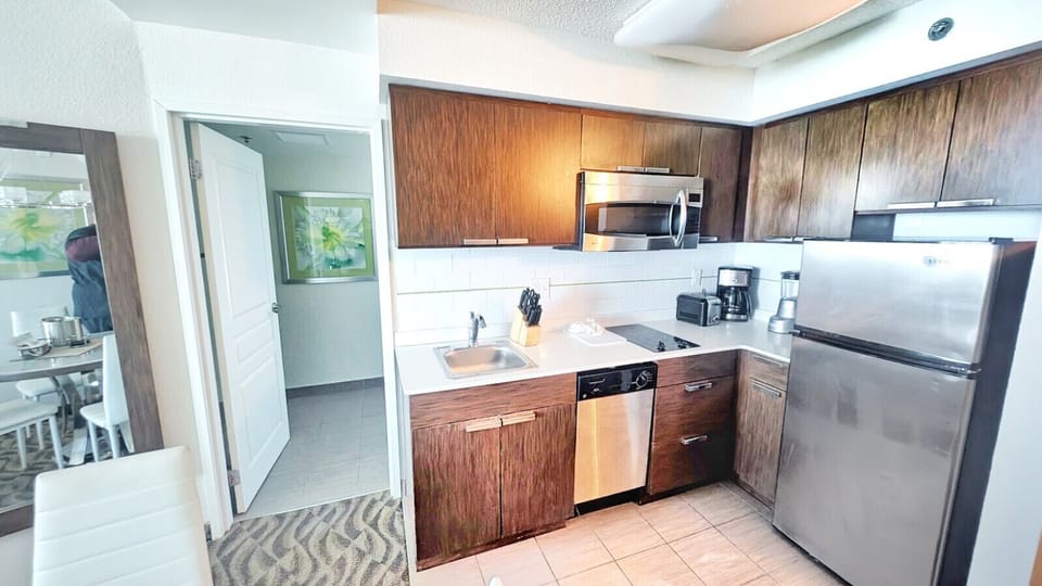 Kitchen needs: Fridge, Microwave, Dishwasher, Coffee Maker, & Toaster!