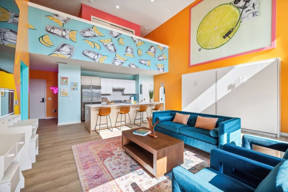 Tequila Sunrise unit: Open concept living room / kitchen / murphy beds