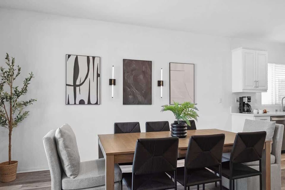 Dining Area: Warm and inviting dining space with a comfortable table setup, perfect for sharing meals, conversations, and quality time with family or friends.