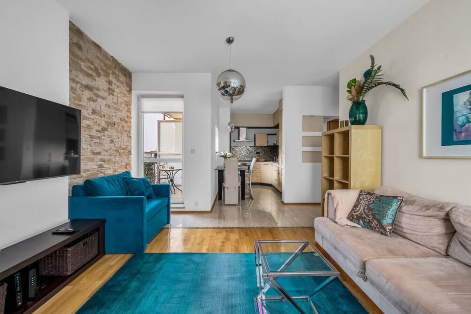 Living Room with 2 Sofa Beds and Big Smart TV | Book Now with RENTUJEMY.COM