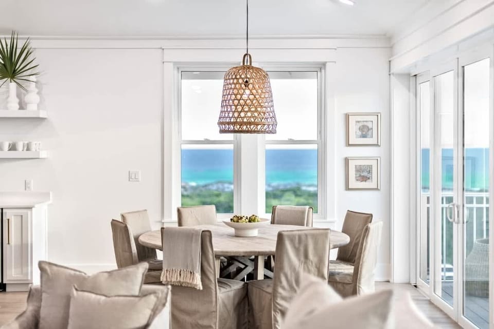 Bright and airy dining space with panoramic ocean views