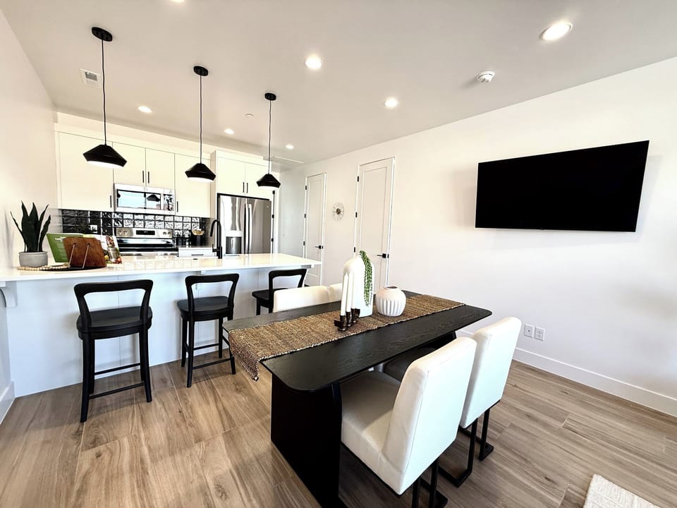 Sleek and spacious kitchen and dining area, perfect for preparing meals and enjoying time with loved ones at Holiday H1 at Catori.