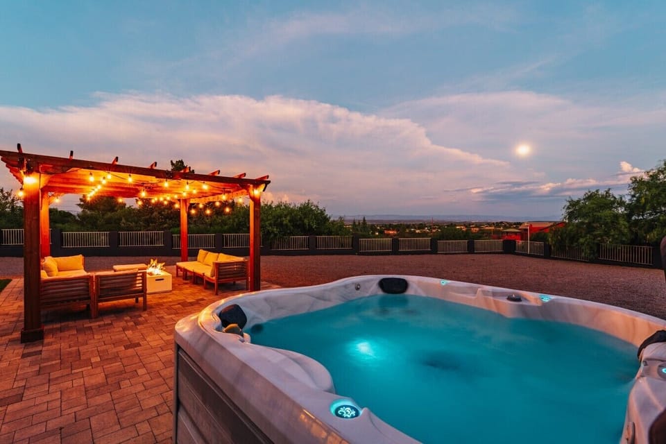 Soak, swim, grill, repeat! 🌞♨️ Your dream Arizona backyard is ready for sunny afternoons and cozy nights.