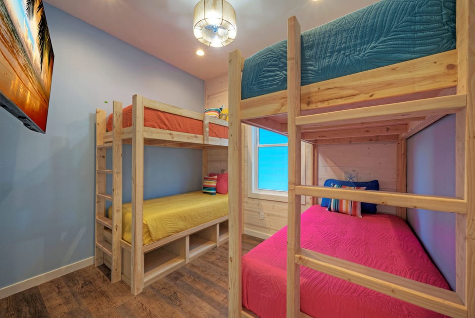Bedroom 4 features two twin-over-twin bunk beds. (Bayview)