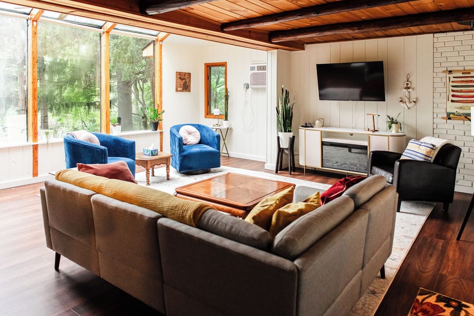 Living room, well decorated and a view from every window