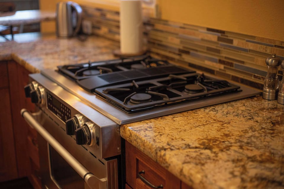 The open, airy kitchen offers ample space & all the comforts of home​