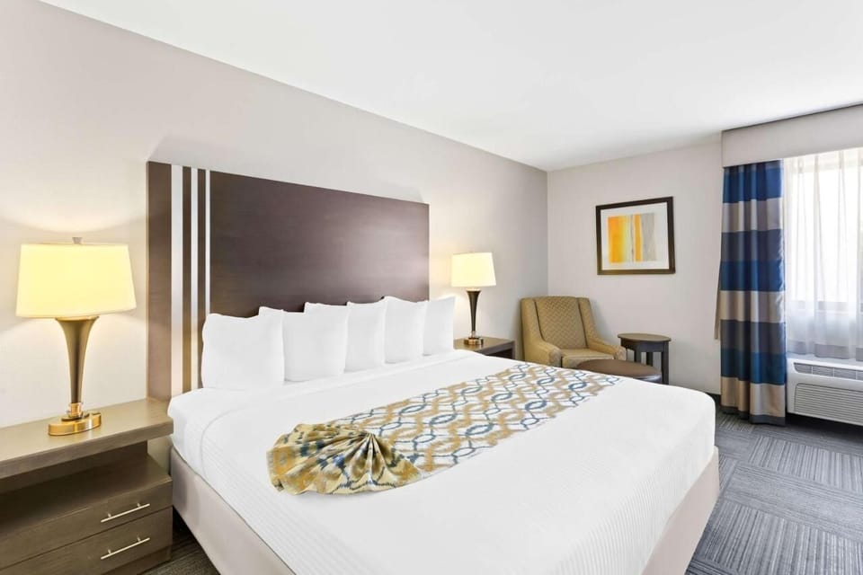 Sink into crisp linens and enjoy soft, calming light.