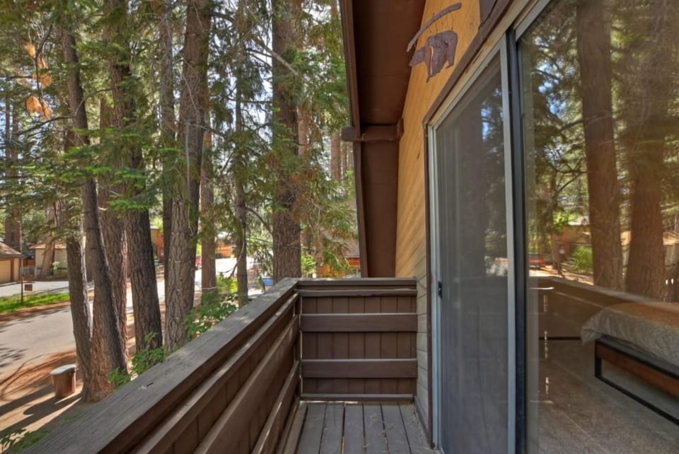 Balcony door connected to Bedroom One.