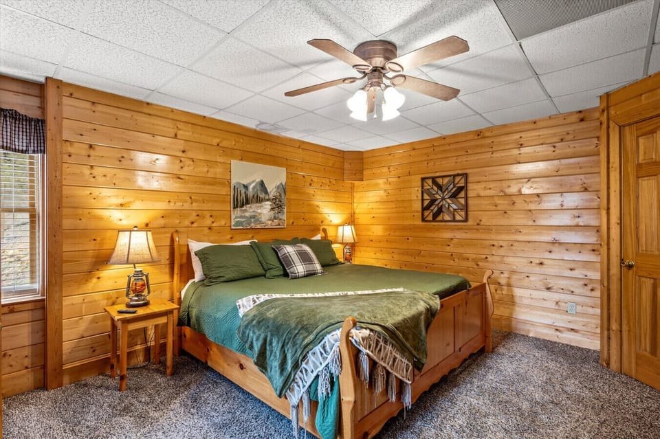 Master King Bedroom with Jacuzzi tub and attached bathroom.