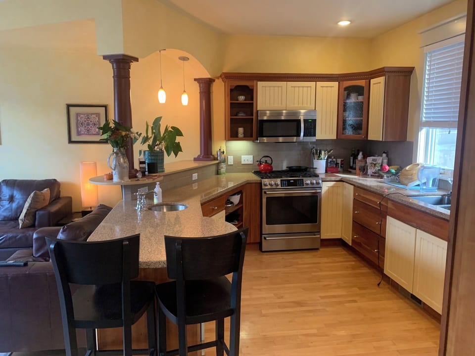 Fully equipped kitchen with gas stove.