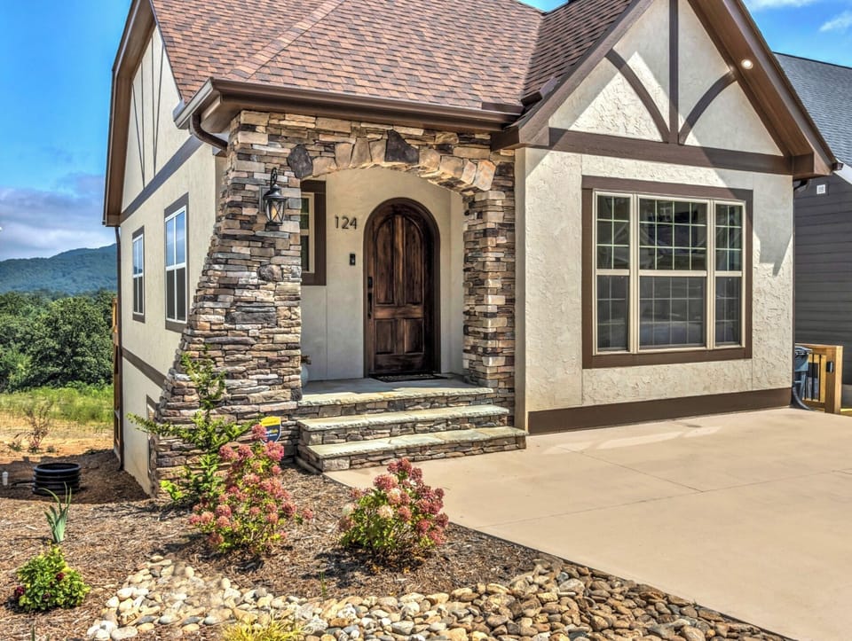 Beautiful Tudor-style house that looks like fairy-tale mountain cottage.