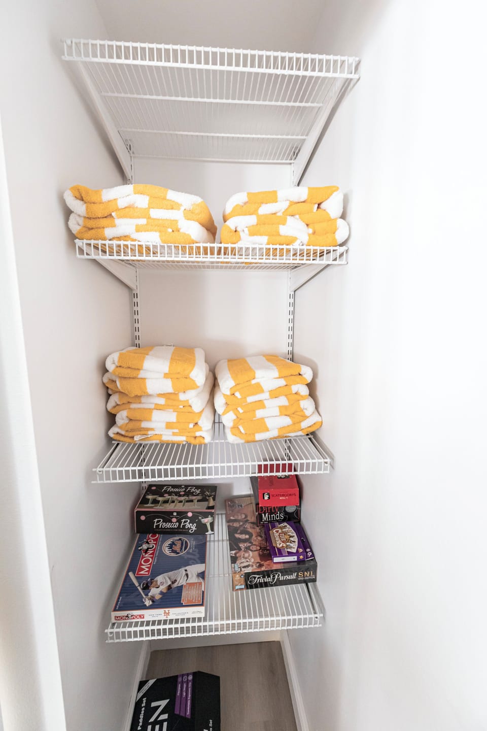 Game closet in main living room.  Beach towels provided.