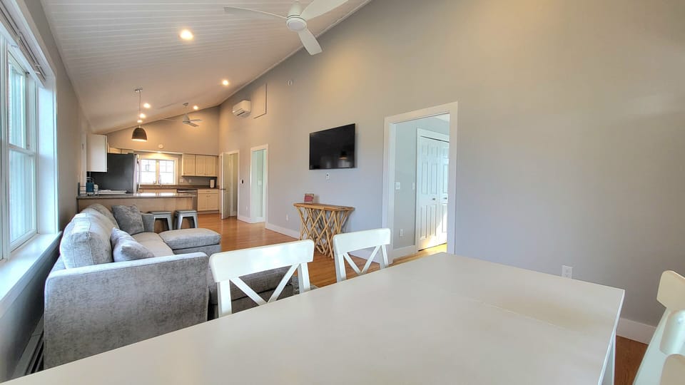 Vaulted ceilings expand the spaces