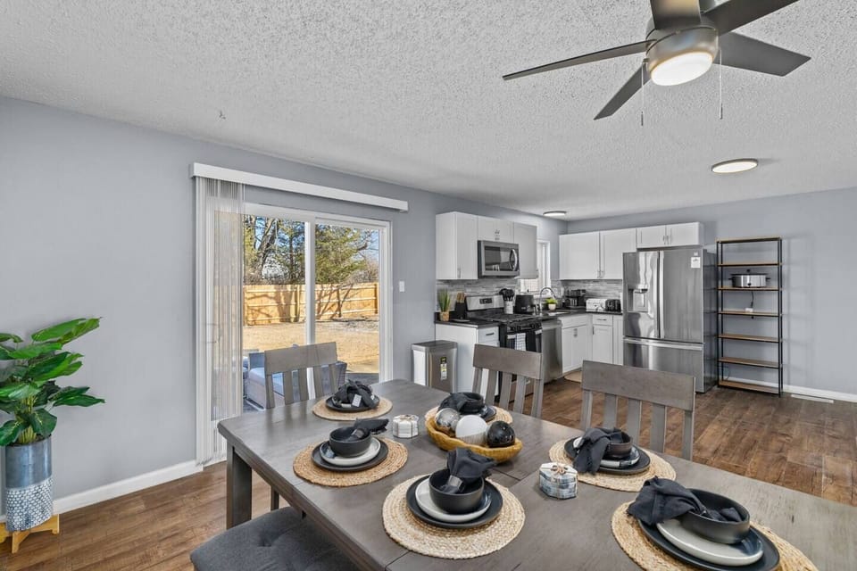 Bright dining area with stylish place settings and natural light