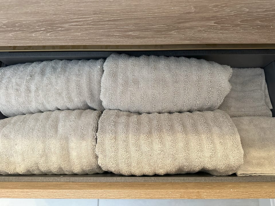 Extra towels in the primary bathroom.