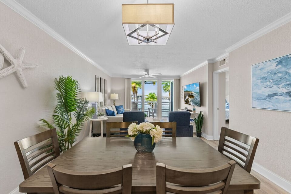 Spacious dining room featuring seating for six.