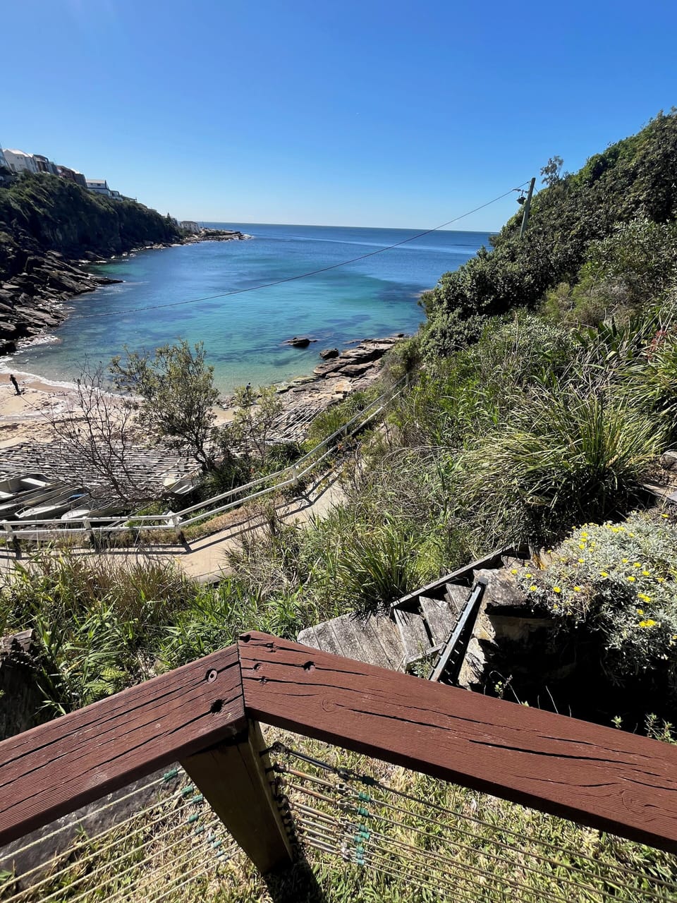 Edge of the garden and steps leading down to Gordons Bay