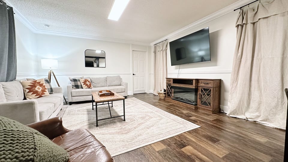 Movie nights made easy with a big TV and plenty of plush seating!