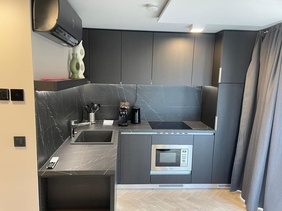 Kitchen, Kitchen Appliance, Countertop, Major Appliance, Flooring, Interior Design, Floor, Kitchen Stove, Furniture, Home Appliance