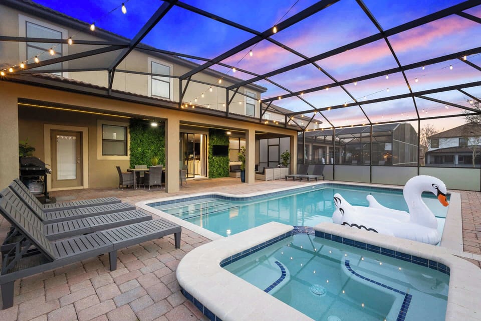 Private swimming pool with hot tub and sun loungers