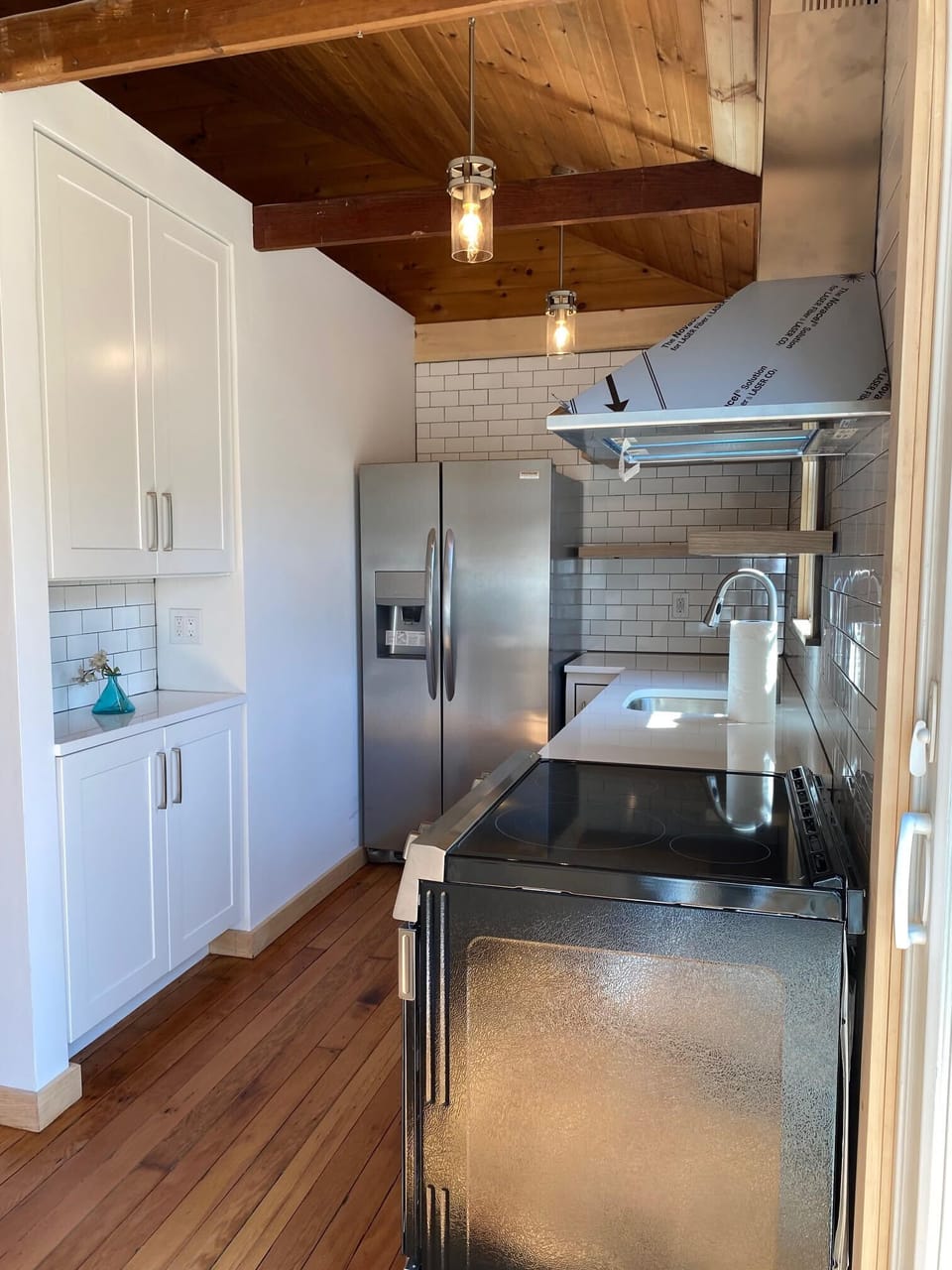 Modern appliances and open shelving