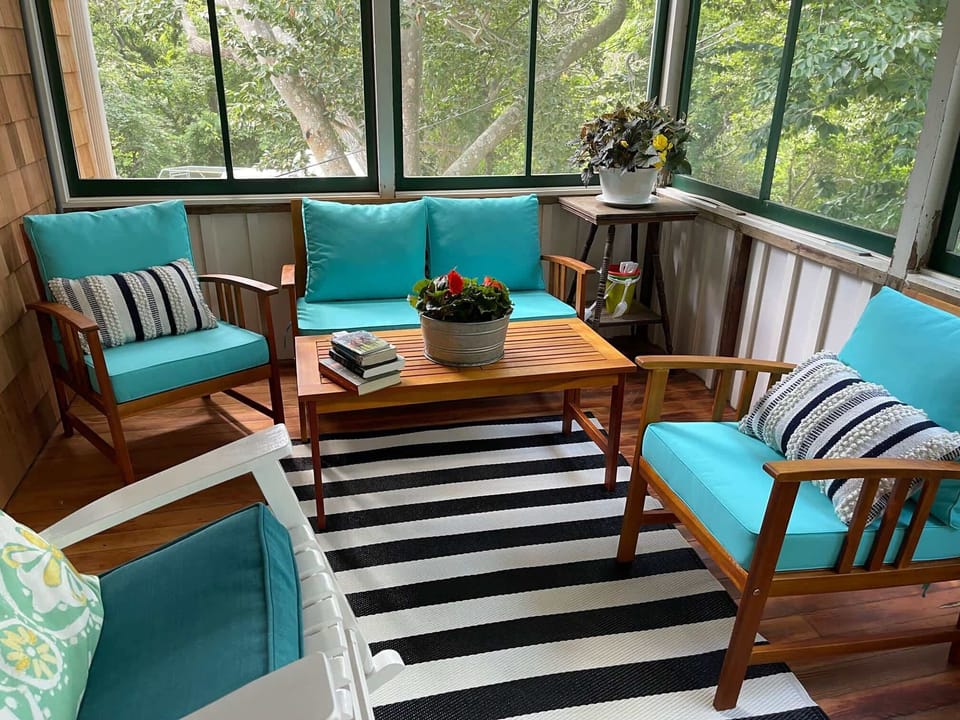 Screened porch with comfortable seating