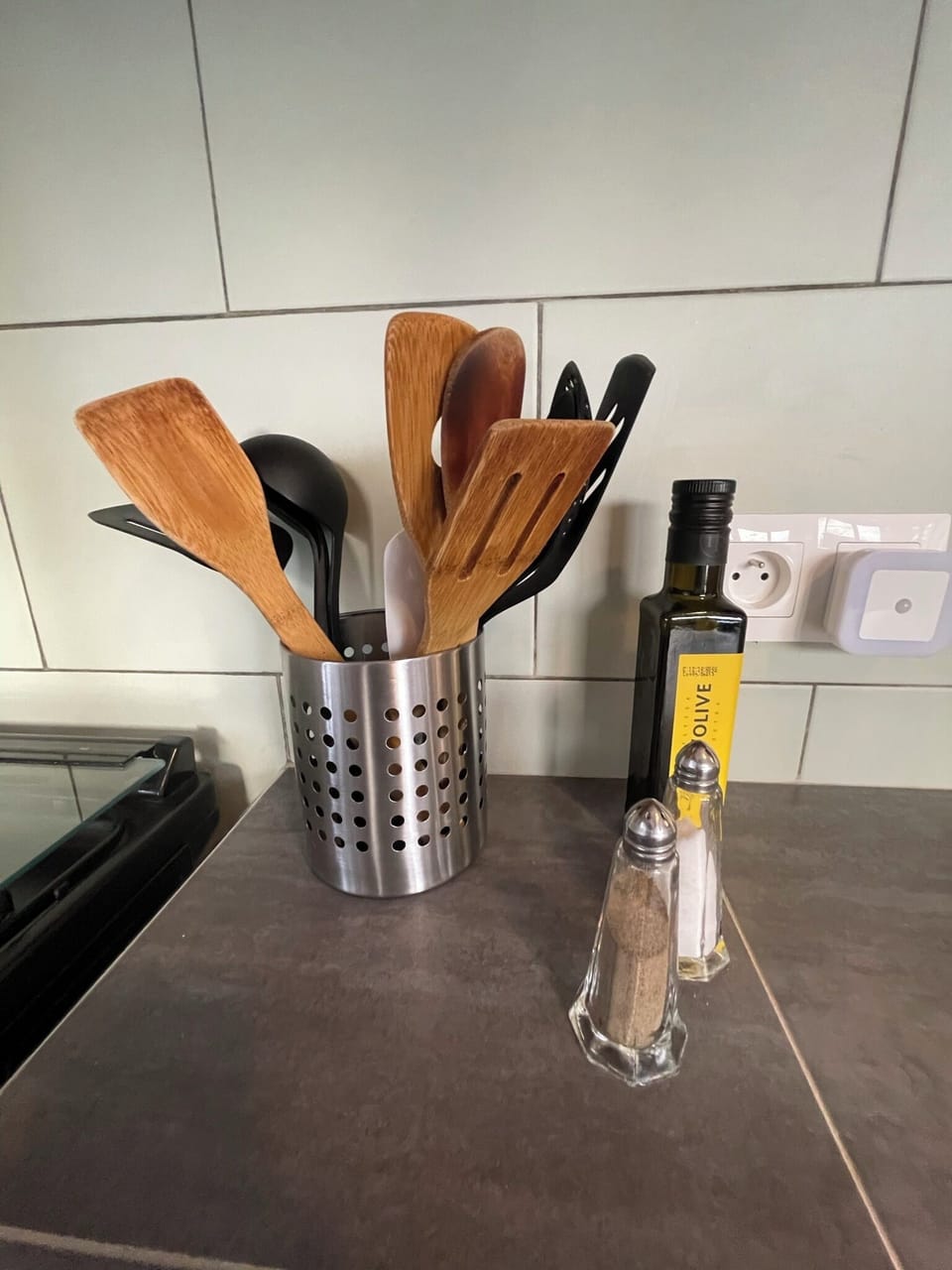 Utensils, oil, salt, pepper