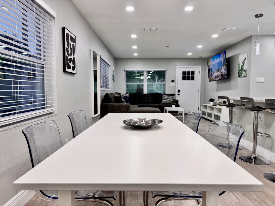 Whether you're enjoying a leisurely family brunch, a romantic dinner, or a fun game night, this space is as versatile as it is inviting.