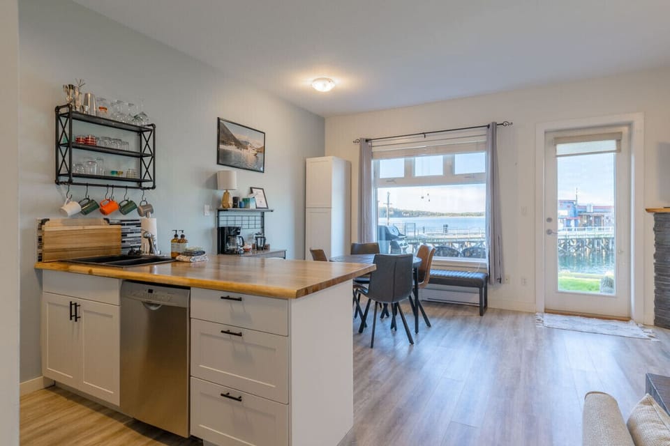 Open concept kitchen/dining are with seating for 4