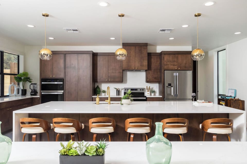 Huge kitchen island and speakeasy hidden pantry.