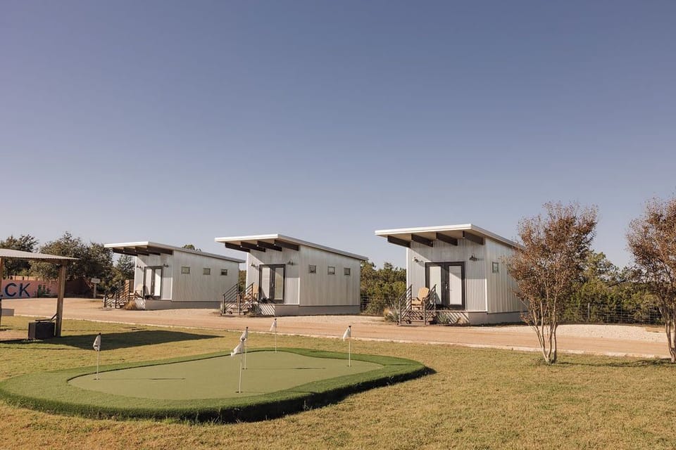 Horseshoe Cottages and a putting green just outside your door.