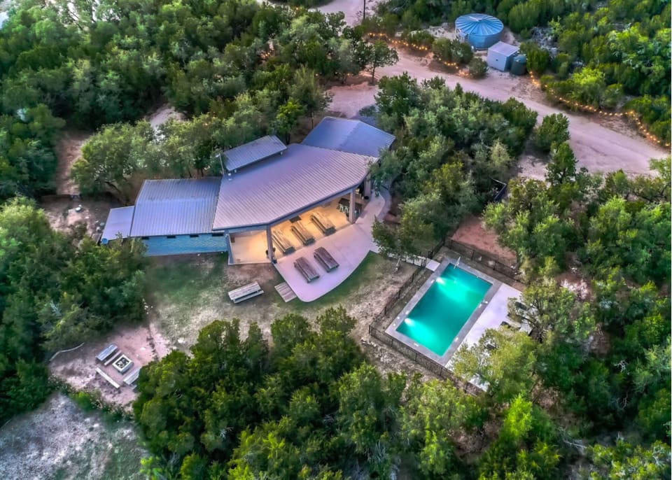 Aerial view of Stellar House, patio and pool