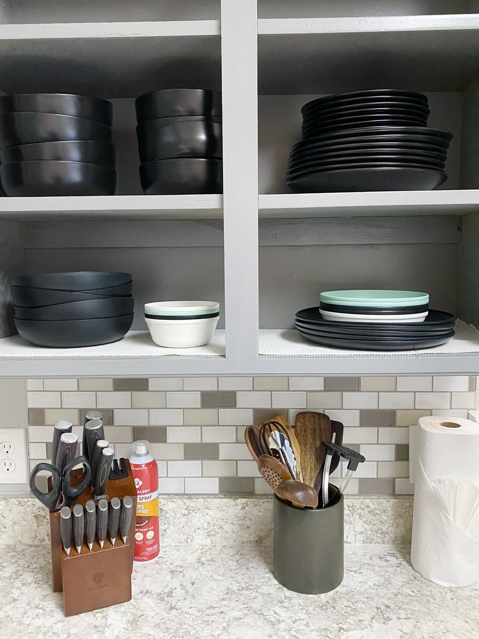 Kitchen Ready for Every Meal – Stocked with bowls, knives, and baking essentials for homemade dishes.