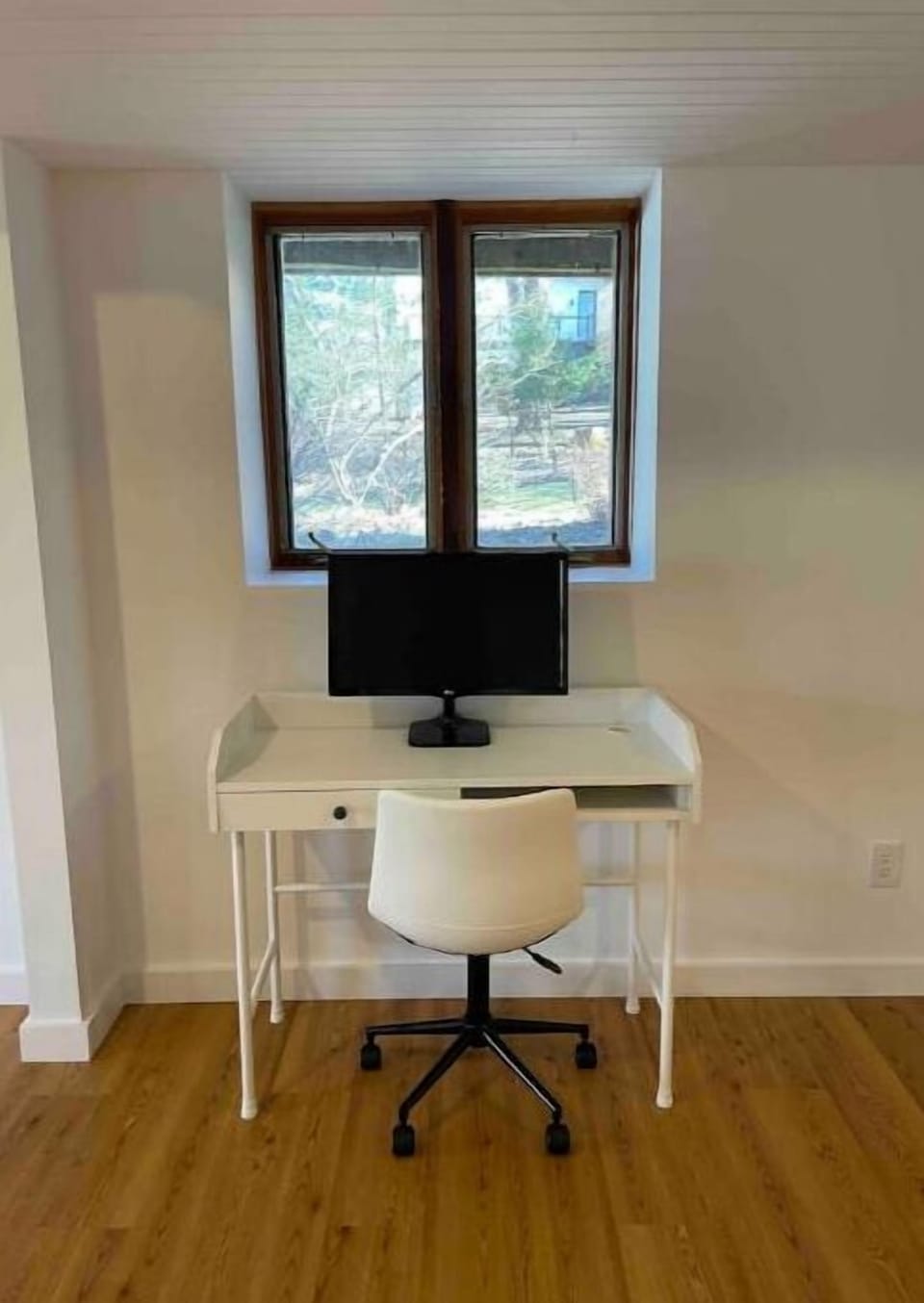 Workstation in walk out basement. 