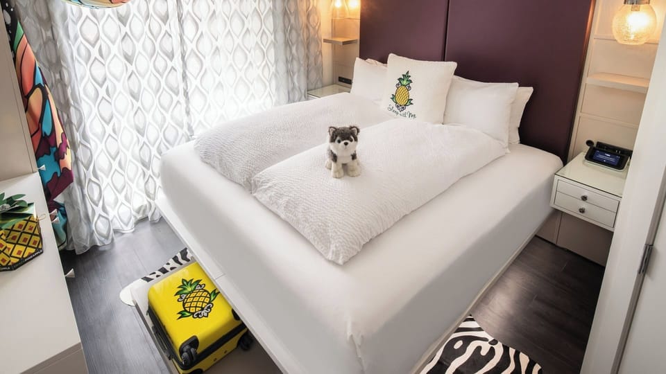 Unwind in crisp linens after a day downtown.