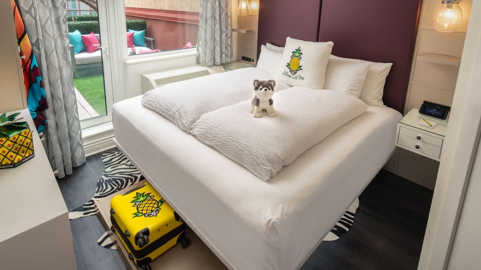 Unwind in crisp linens after a vibrant city day.