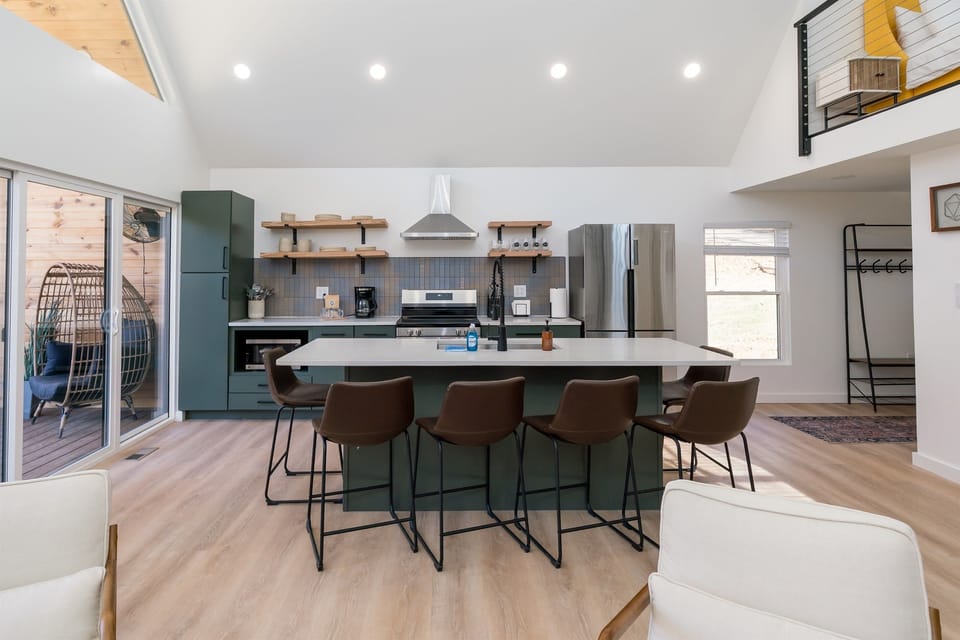 Enjoy meals together at the spacious island, comfortably seating six guests.