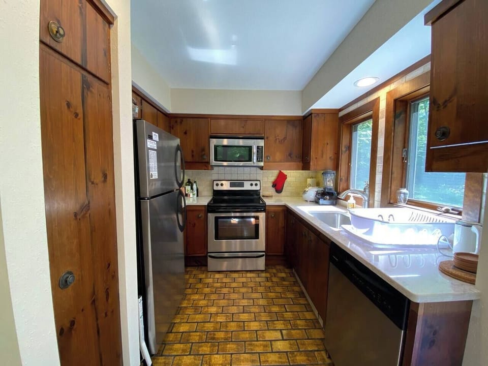 Fully equipped and ready for your culinary creations—this kitchen has everything you need to make a home-cooked meal or a quick snack.