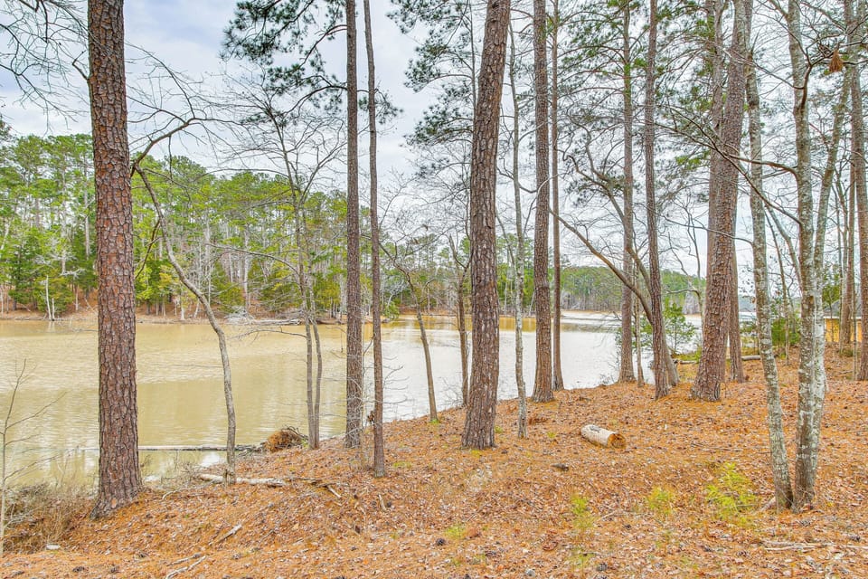 Townhome Exterior | Lake Views & Access | Canoe